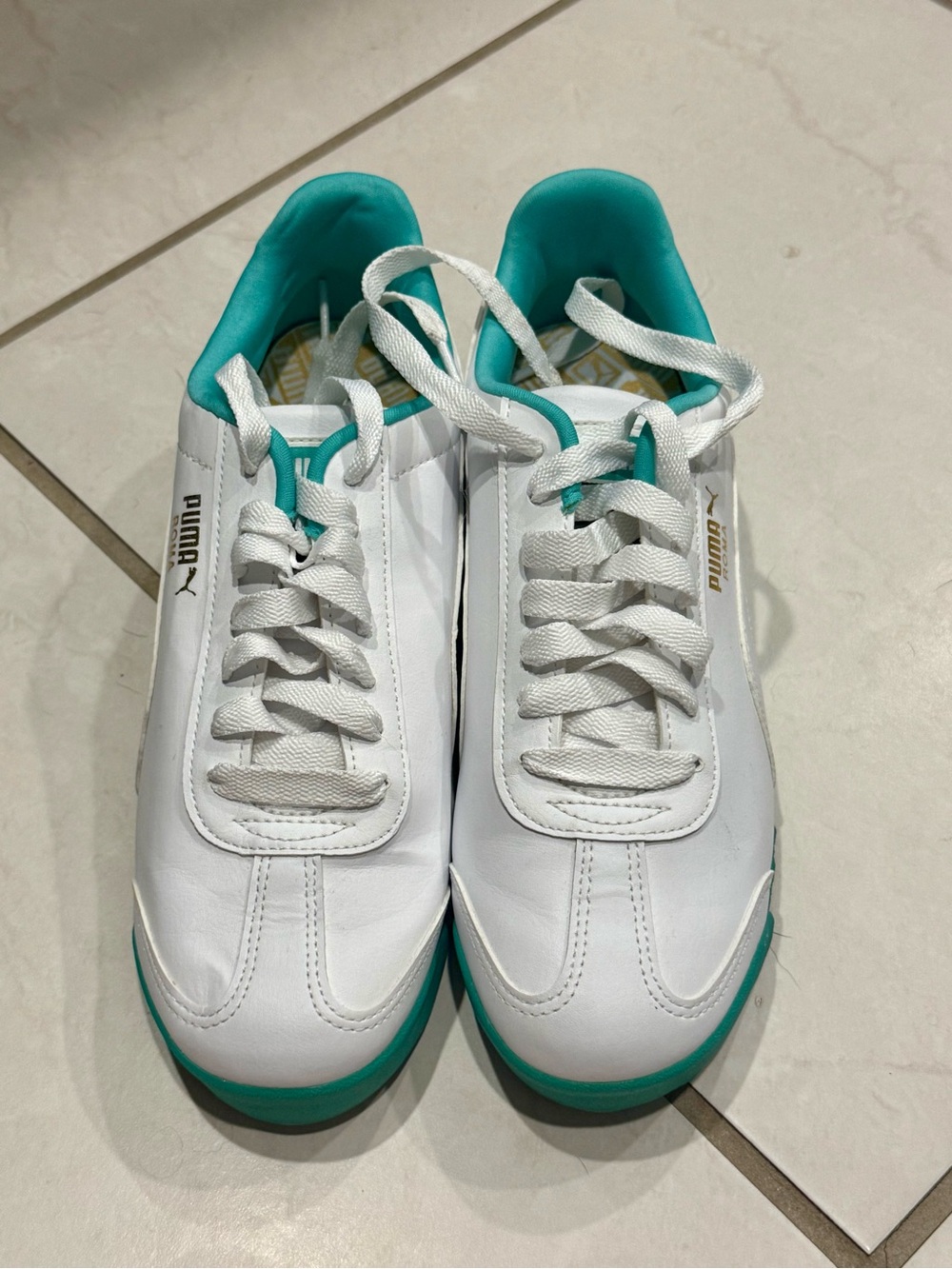 Puma Roma Teal and White sneakers